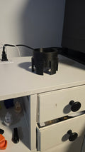 Porte-canette à fixer au bouchon d'essence.